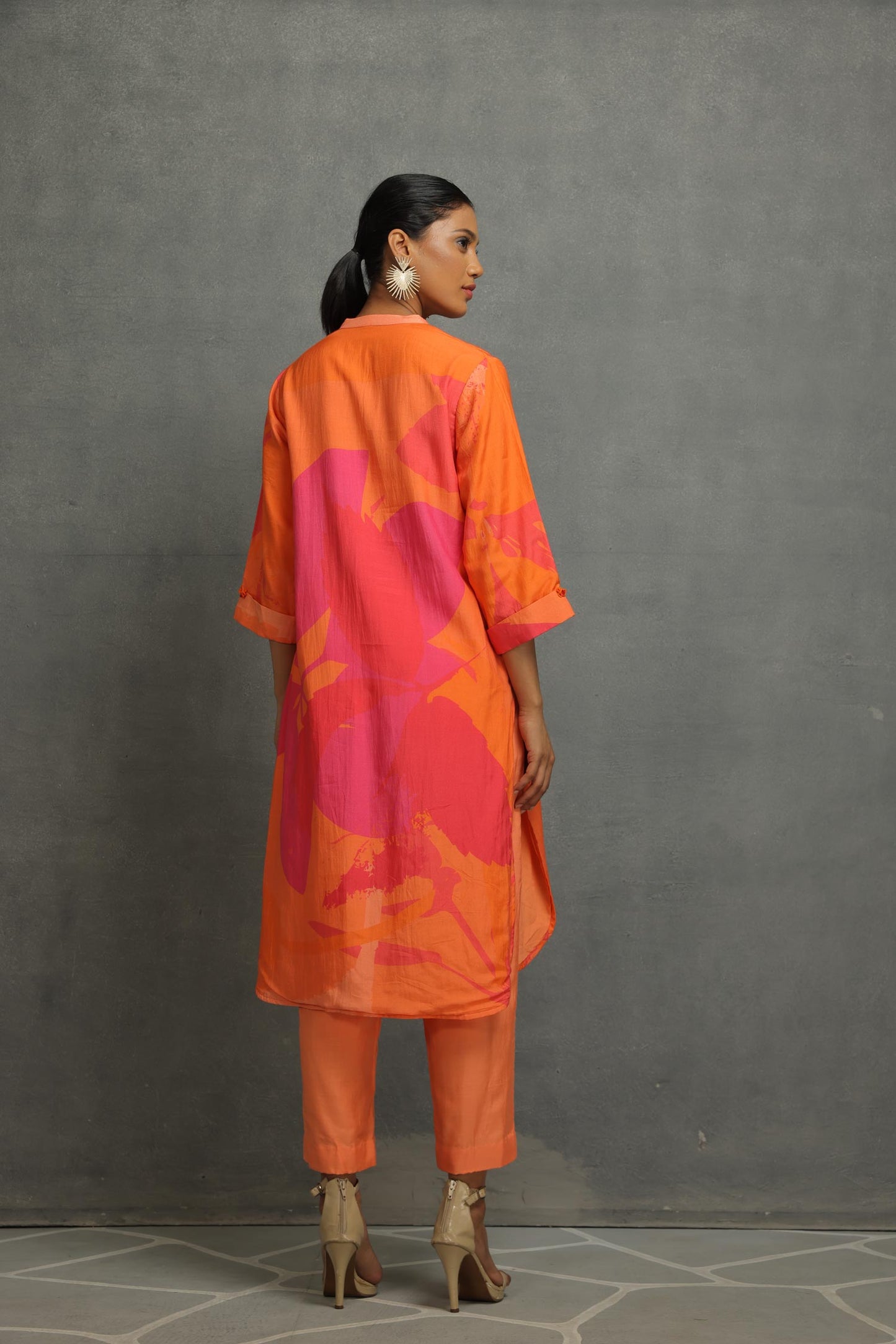 Orange shirt in cotton silk base with digital print and hand embroidery
