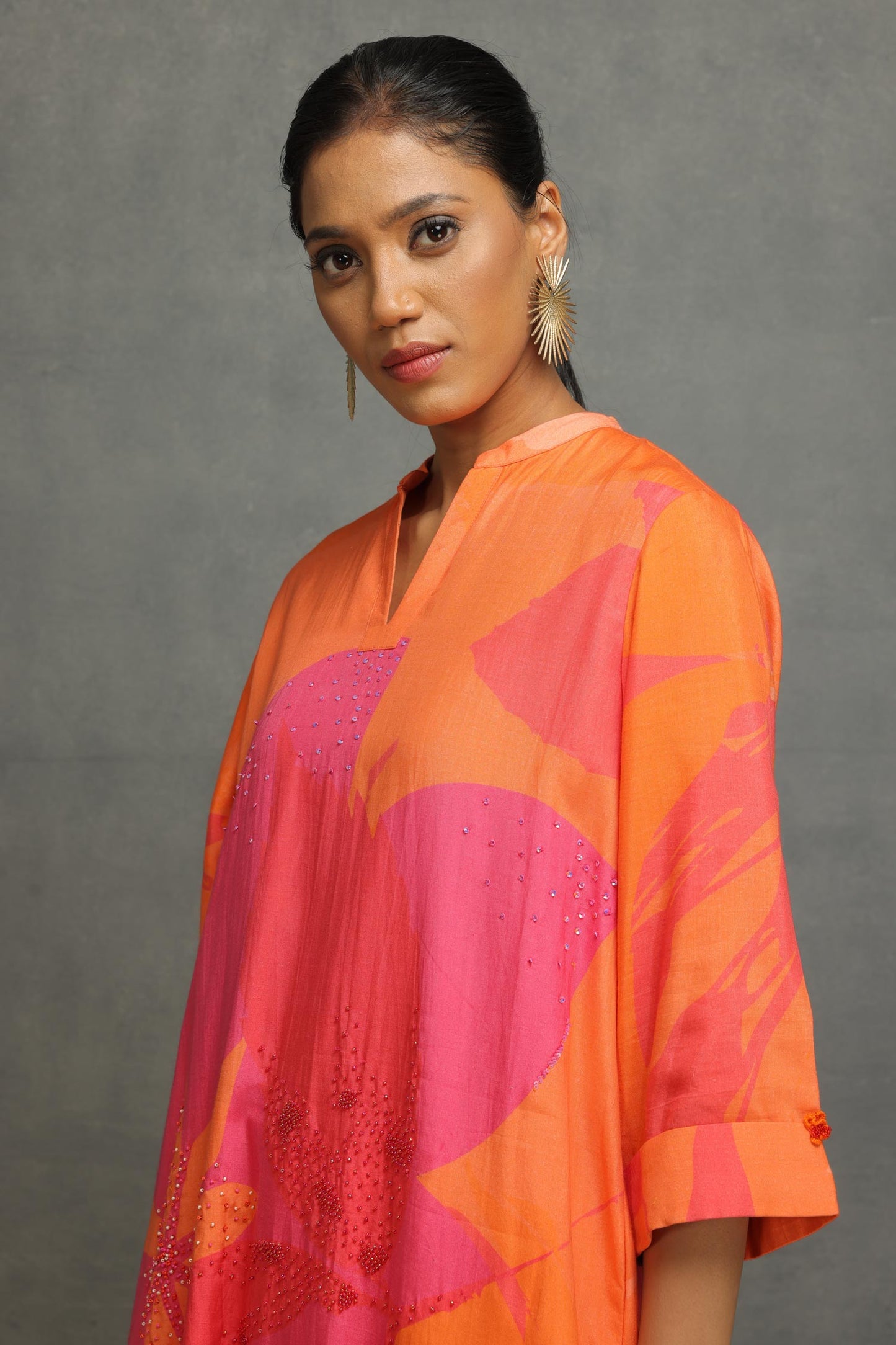 Orange shirt in cotton silk base with digital print and hand embroidery